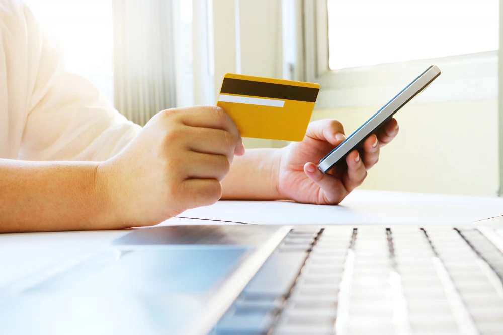 Woman using credit card