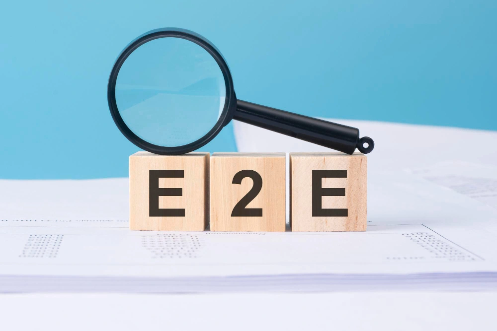 E2E word on wooden cubes